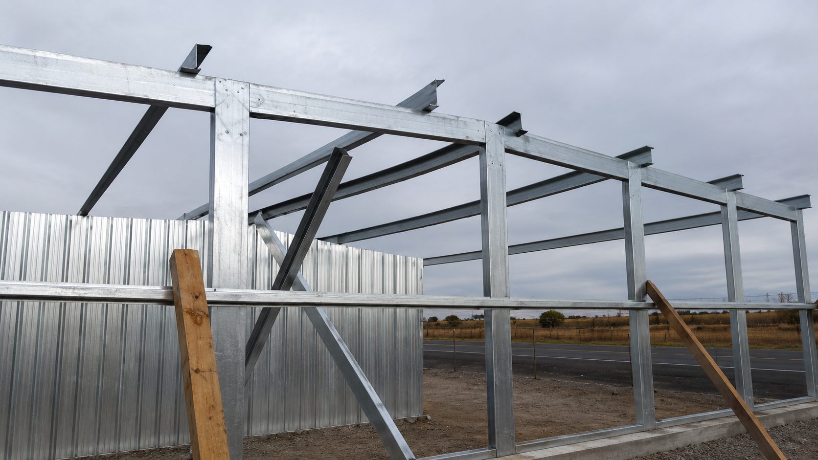 Steel frame close-up overcast sky